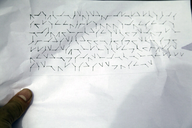 A message enciphered as a series of straight and diagonal lines